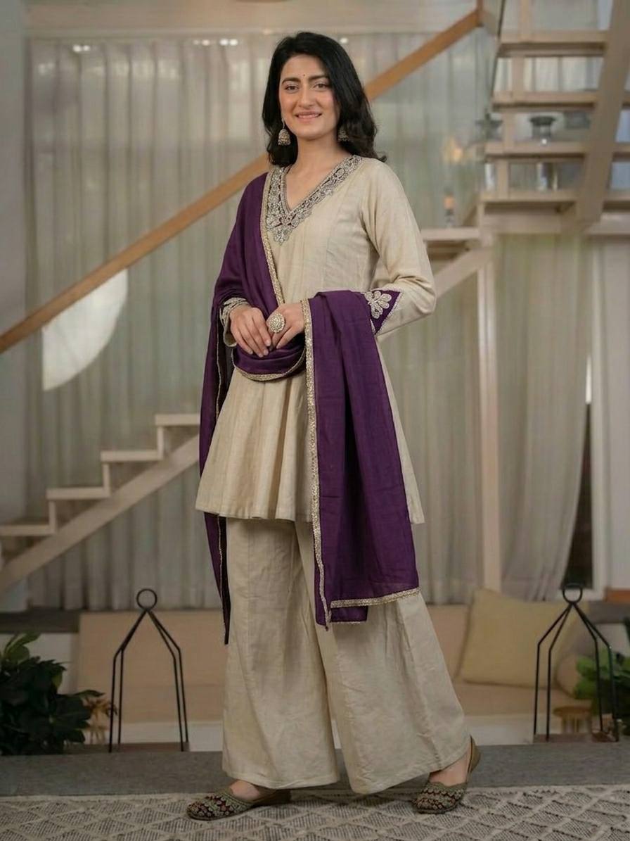 Regal Cream Silk Peplum Kurti and Flared Palazzo Suit Set Adorned with Ornate V-Neck Embroidery and a Rich Plum Purple Dupatta